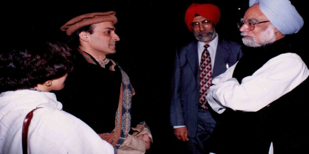 With the Prime Minister of India, Dr. Manmohan Singh, discussing issues of social development.